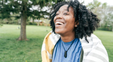 Woman smiling in park