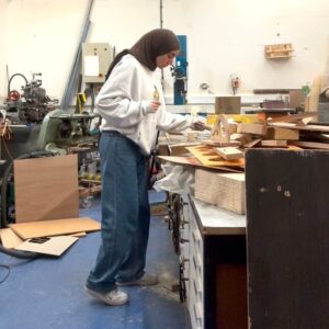 Fareda, a REMAP volunteer, works on a new project