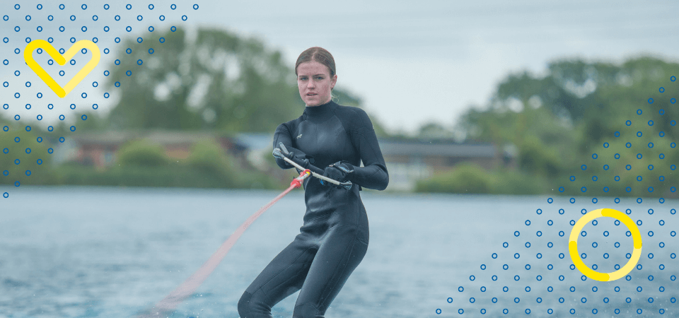 A person waterskiing using a bespoke adaptor