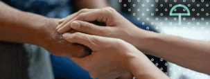 Two people holding hands